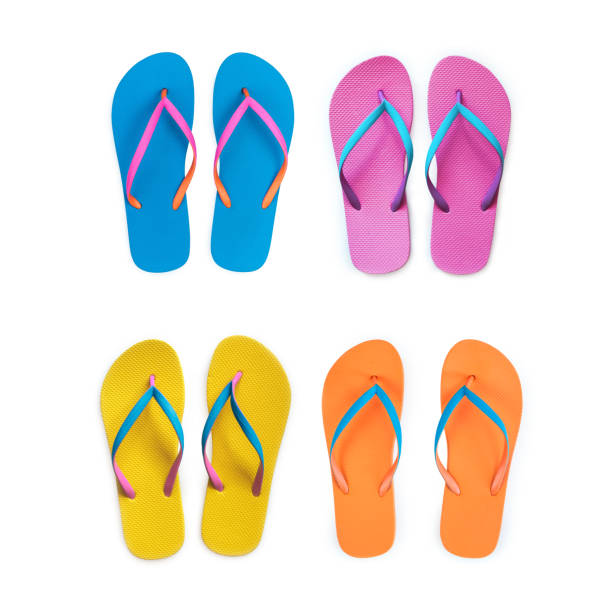 Yellow Orange Pink Blue flip flops isolated on white background. Top view Yellow Orange Pink Blue flip flops isolated on white background. Top view thong stock pictures, royalty-free photos & images