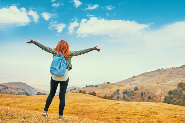 istock Beauty woman outdoors enjoying nature. 1066313488