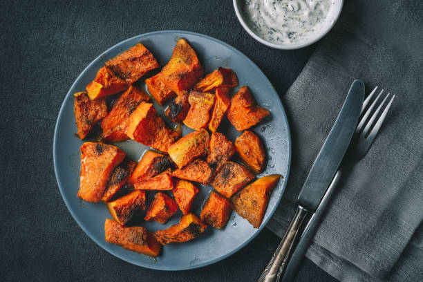 istock Top view of roasted pumpkin in rustic style 1066318224