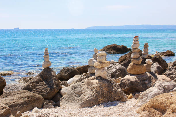 istock Beautiful seascape,  little stones pyramids 1066327168