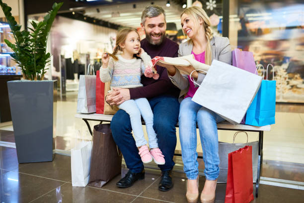 istock Family in Mall 1066336270