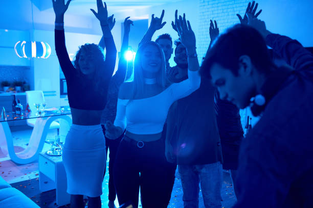 istock Dancing people on Christmas party in house 1066343128
