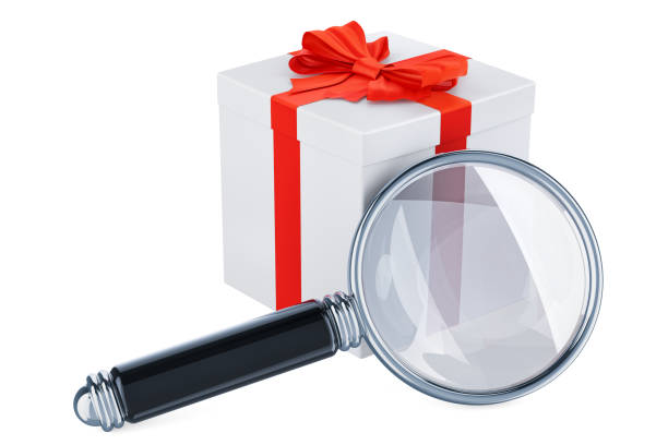 istock Magnifying glass with gift box. Gift search concept. 3D rendering isolated on white background 1066343238
