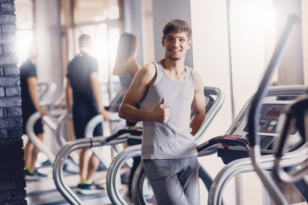 istock A man rejoices with his result on the treadmill 1066358926