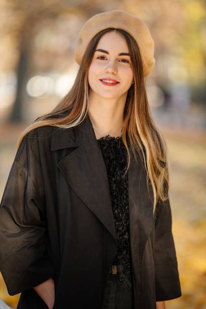 istock Girl stand on the park background and pose to camera 1066365030
