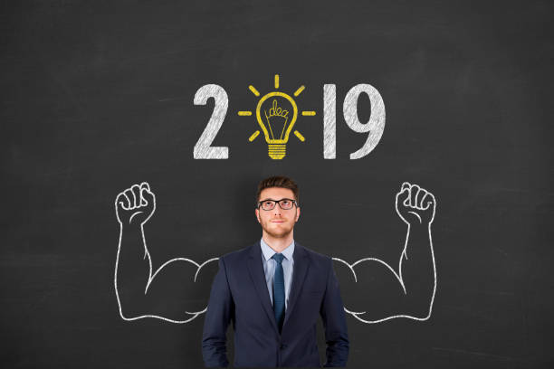 istock New Year 2019 Idea Concepts over Human Head on Blackboard Background 1066376532