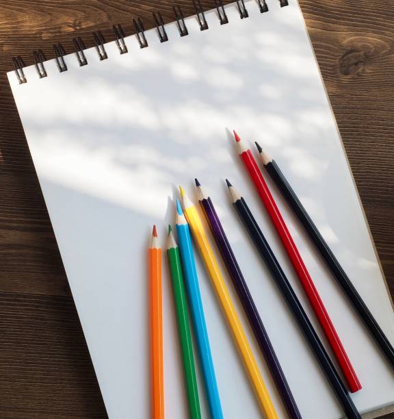 cadernos, café e lápis de cor - workbook notebook pen ballpoint pen - fotografias e filmes do acervo