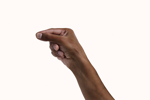 hand of an African man pulling something isolated on white