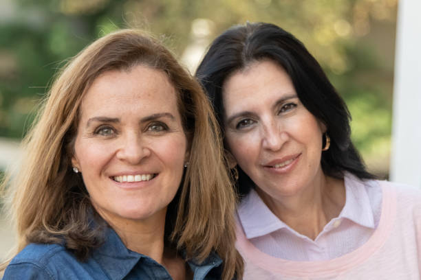 istock smiling mature women posing looking at the camera 1066381382