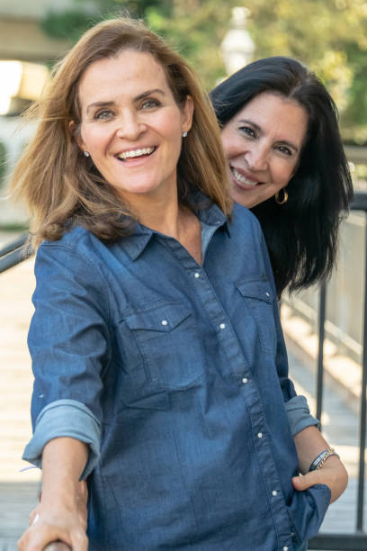 istock smiling mature women posing looking at the camera 1066383038