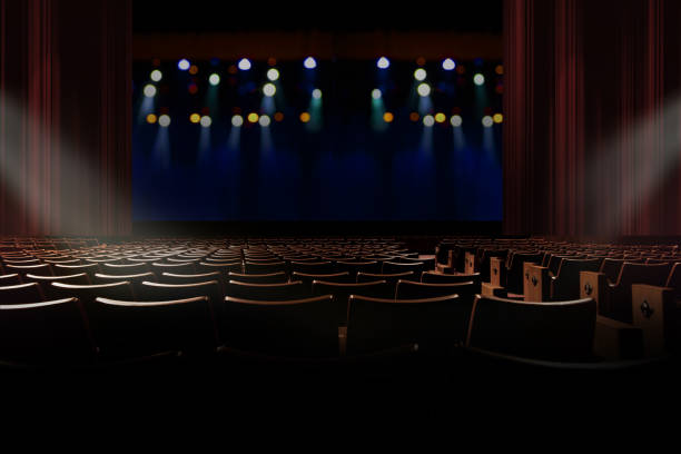istock empty seat in vintage auditorium or theater with lights on stage. 1066400314