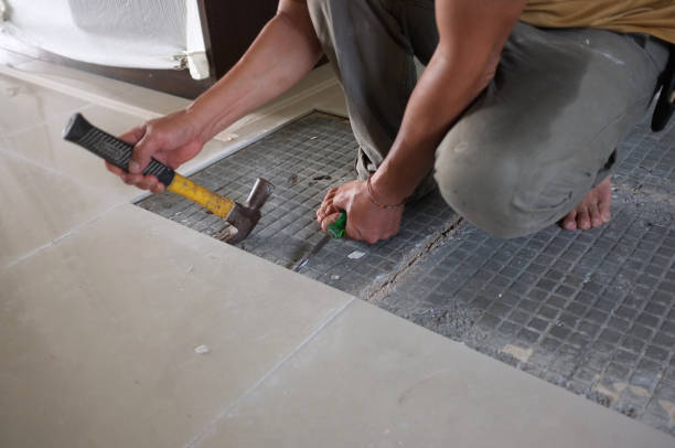 istock Homemade Replacing floor Ceramic tiles broken, and a tile adhesive plaster out the old to cement glue. For a new tile support again on same area . 1066401562