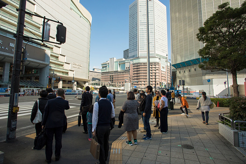 osaka japan - november11,2018 : unidentified people waiting for crossing road in osaka city ,osaka is most important city in middle south of japan