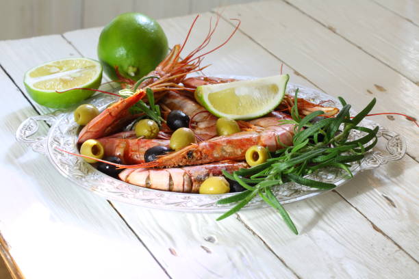 istock Langoustine with lime and white wine 1066422206