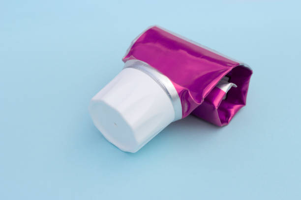 istock Empty tube of toothpaste on blue background 1066422606