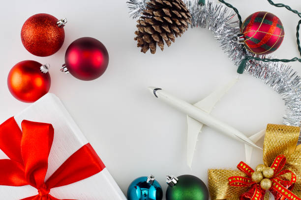 istock Christmas decorations and presents on white background 1066428802