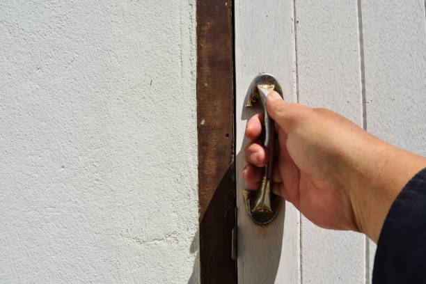 istock The hand is holding the handle on door 1066435012