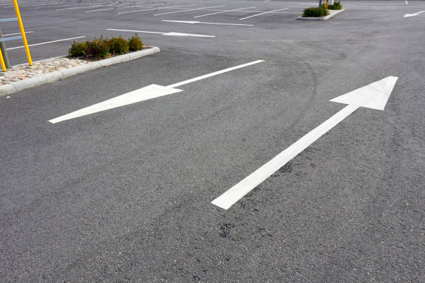 istock lane arrows on tarmac 1066447662