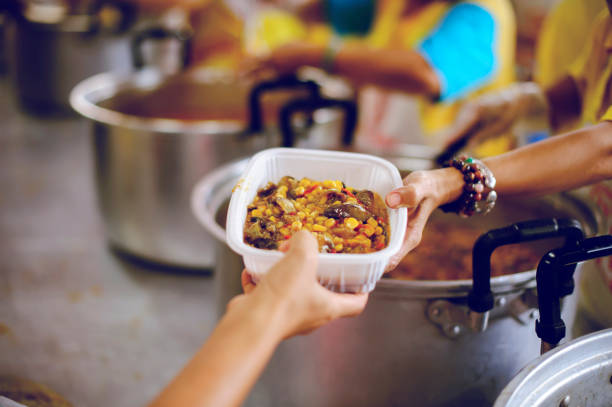 istock Social Problems of Poverty Helped by Feeding: Concepts problems of life the poor 1066447778
