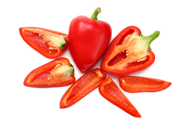 istock sliced red sweet bell pepper isolated on white background. top view 1066451352
