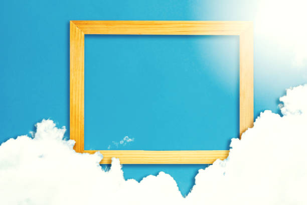 istock Square wooden frame, Creative Beautiful blue sky with white clouds for background . with paper card note. Blank for advertising card or invitation. Nature concept 1066456446