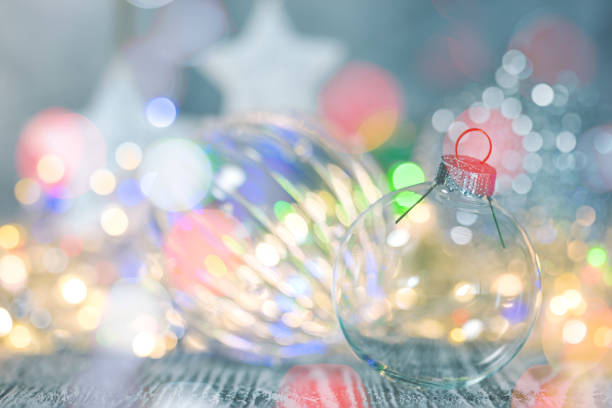 festive winter holidays background with blurred sparkling christmas lights