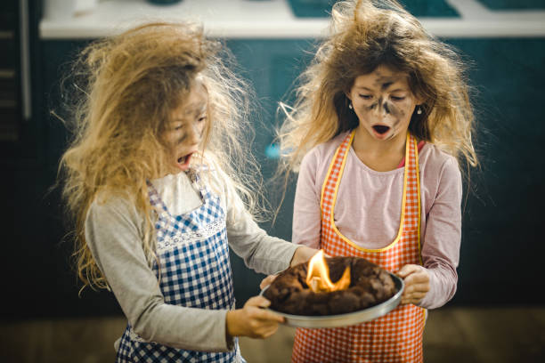 istock Oh my God, we have burnt the cake! 1066464514