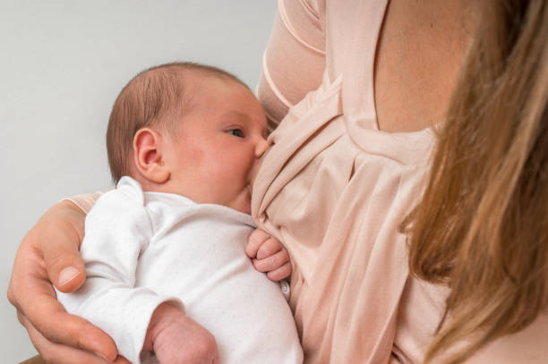 istock Mother is breastfeeding her newborn baby 1066474112