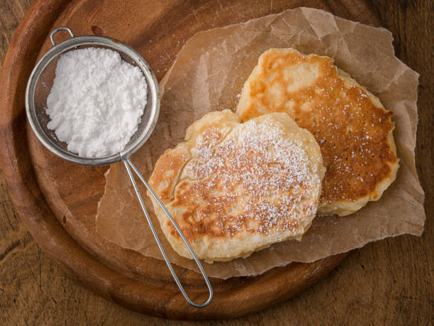 pancakes with powdered sugar stock photo
