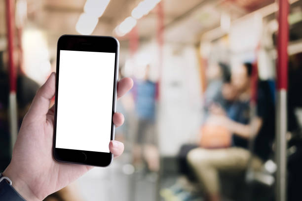 istock Mockup smartphone blank screen in woman hands over blurred background. 1066475860