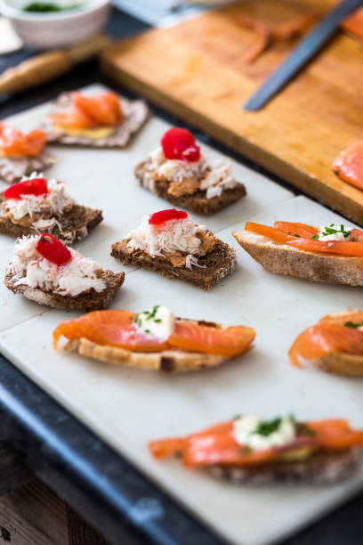 istock Freshly Prepared Smoked Salmon and Crab Canapes on Crusty Bread 1066484306