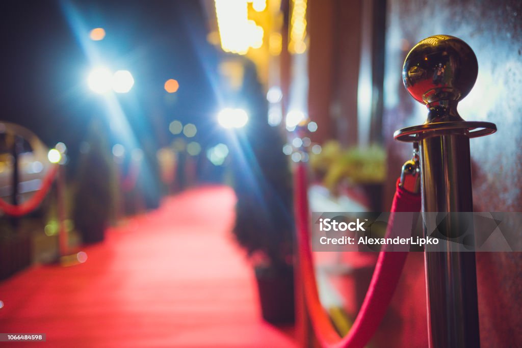 red carpet entrance A red carpet is traditionally used to mark the route taken by heads of state on ceremonial and formal occasions Film Festival Stock Photo