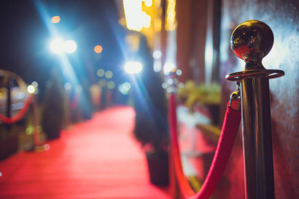 red carpet entrance A red carpet is traditionally used to mark the route taken by heads of state on ceremonial and formal occasions film festival photos stock pictures, royalty-free photos & images