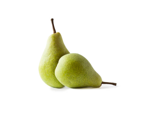 istock Ripe pears isolated on a white background. Pears with copy space for text. Green pears close-up. Pears on white background. 1066487418