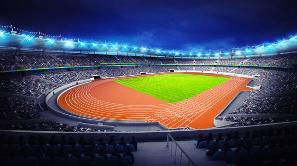 istock athletics stadium with track and grass field at corner view 1066489824
