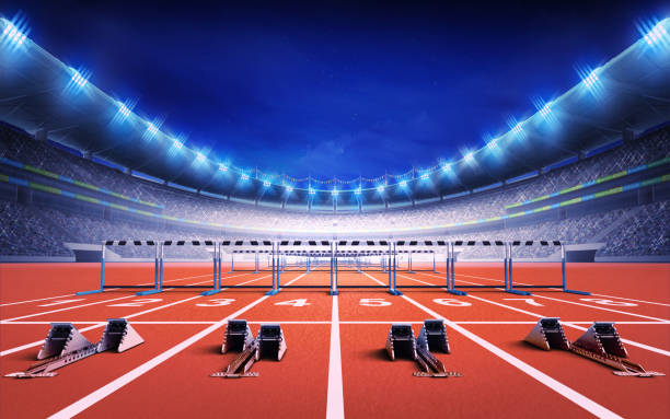istock athletics stadium with race track with starting blocks and hurdles 1066489984