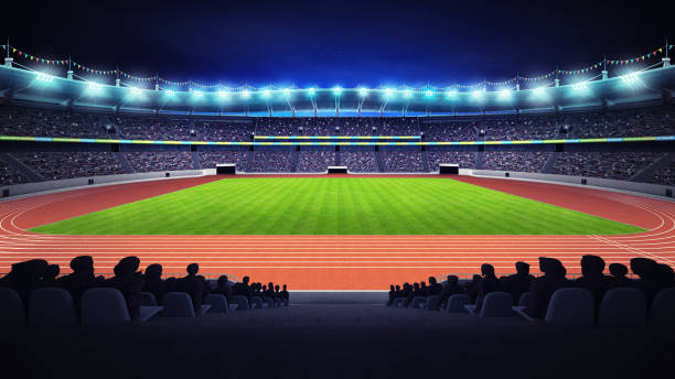 estadio de atletismo con campo de pista y hierba en vista de noche - sports track track and field stadium sport night fotografías e imágenes de stock