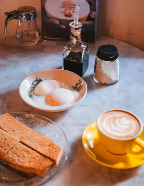 Singaporean breakfast with Kaya toast and soft-boiled eggs