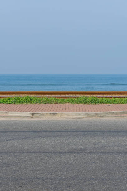 istock Sea, street and railway 1066494260
