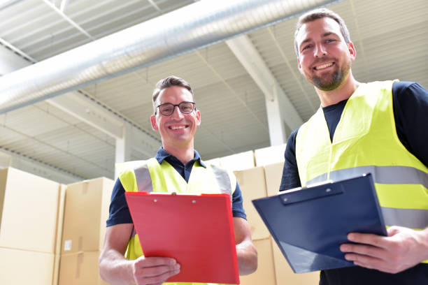 istock Worker in a warehouse in the logistics sector - transport and processing of orders in trade 1066494314
