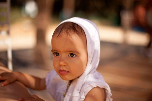 istock Cute baby on the beach after the first sea experience 1066494688