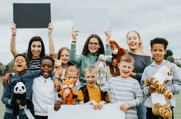 Group Of Kids Caring About Animal Rights Stock Photo - Download Image Now -  Child, Human Rights, Protest - iStock