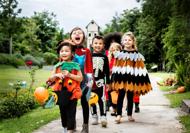 istock Young kids trick or treating during Halloween 1066500834