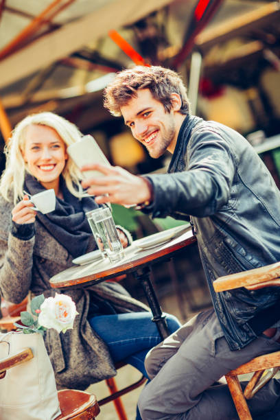 istock Happy young couple having fun taking selfie 1066503976