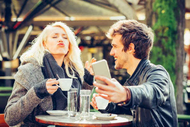 istock Happy young couple having fun taking selfie 1066504022