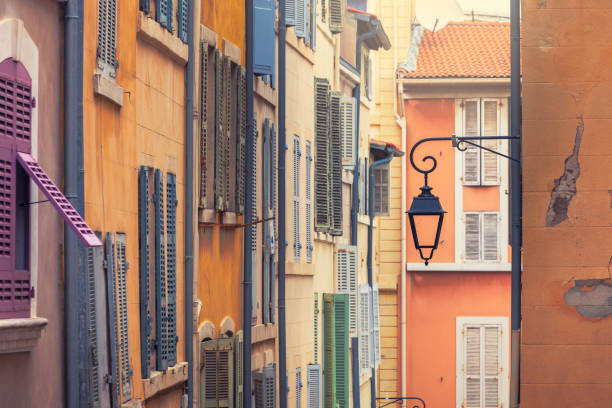 Colorful old house facades in the old Le Panier district of Marseille, France.