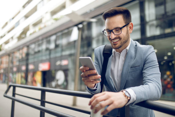 istock Young businessman reading text message on mobile phone 1066506550