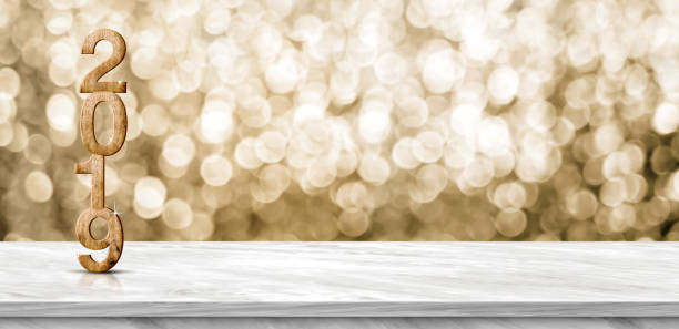 istock Happy new year 2019 (3d rendering) on grey marble table at gold sparkle bokeh abstract background,mock up banner holiday greeting card. 1066508880