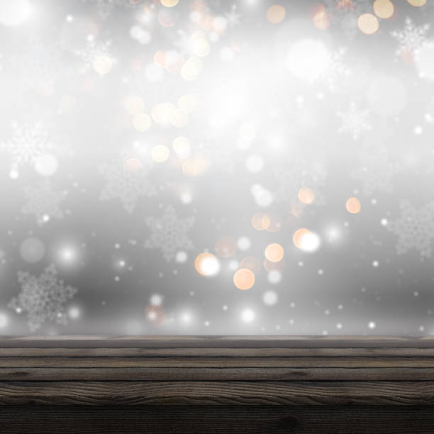 istock 3D wooden table looking out to a defocussed Christmas background 1066511364