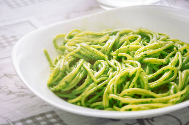 istock A plate of spaghetti with pesto sauce 1066513918